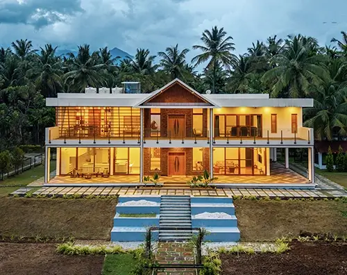 Punya Farms luxury farm stay near Isha Yoga Center in Coimbatore with spacious gardens and private accommodation.