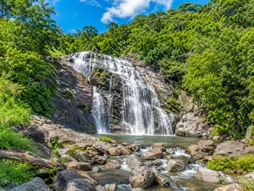 Visit the beautiful Kovai Kutralam Waterfalls during your stay at Punya Farms, located close to Coimbatore's popular nature attraction.