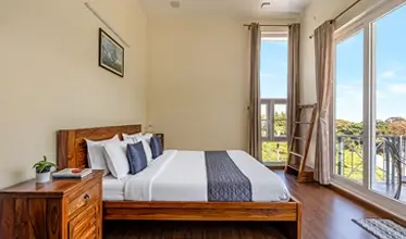 Premium first floor luxury bedroom at Kalpavriksha Villa near Ooty.