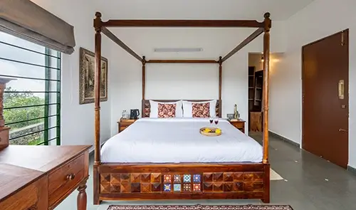 Meadow Suite bedroom in Kotagiri