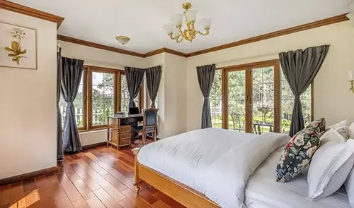 Comfortable guest room at The Winterfel Kotagiri