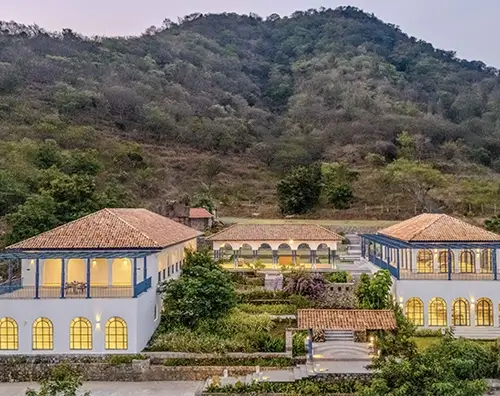 Maayaa Hillside Villas & Resorts in Anaikatti surrounded by lush green hills, ideal for family holidays and group stays.