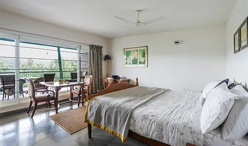 Premium Horizon Suite king bedroom at luxury homestay in Kotagiri
